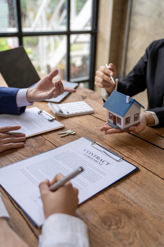 Rental agreement, Sale agent deal to agreement successful home loan contract with customer and sign
